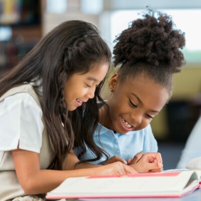 two girls reading